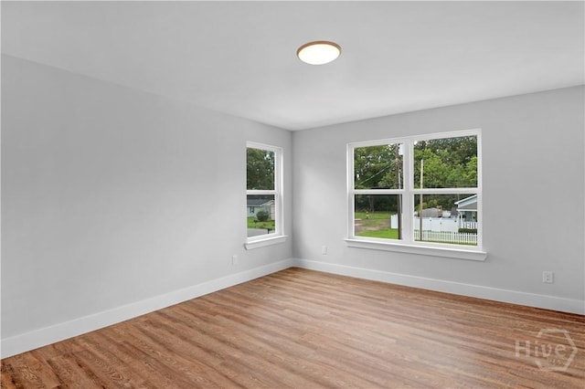 220 N Skinner Ave, Pooler, GA 31322 - unfurnished room featuring baseboards and wood finished floors