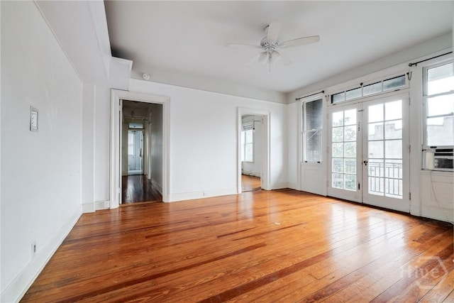 24 E Liberty St Unit 44, Savannah, GA 31401 - spare room with ceiling fan, light wood-style floors, baseboards, and french doors
