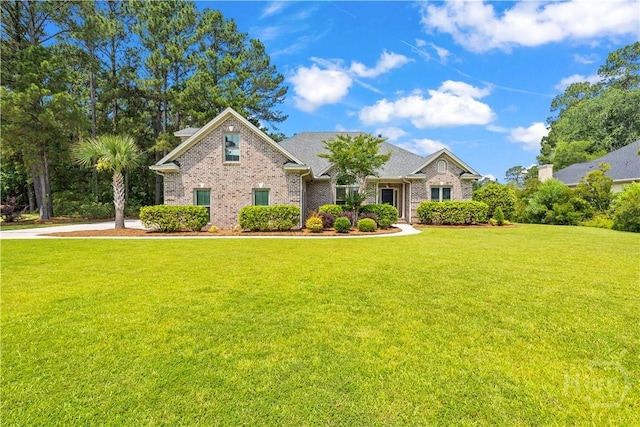 760 Southbridge Blvd, Savannah, GA 31405 - view of front of house featuring a front yard and brick siding