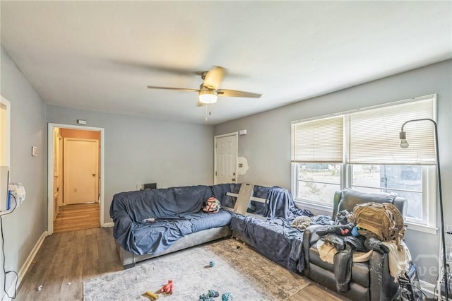 325 Bunting Dr, Savannah, GA 31404 - living room featuring a ceiling fan, wood finished floors, and baseboards