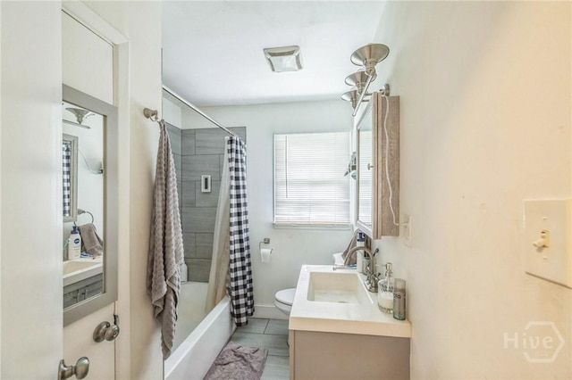 325 Bunting Dr, Savannah, GA 31404 - bathroom with shower / bath combo, double vanity, toilet, and tile patterned floors
