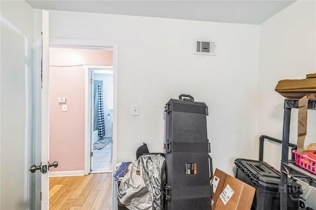 325 Bunting Dr, Savannah, GA 31404 - misc room featuring light wood-type flooring and baseboards