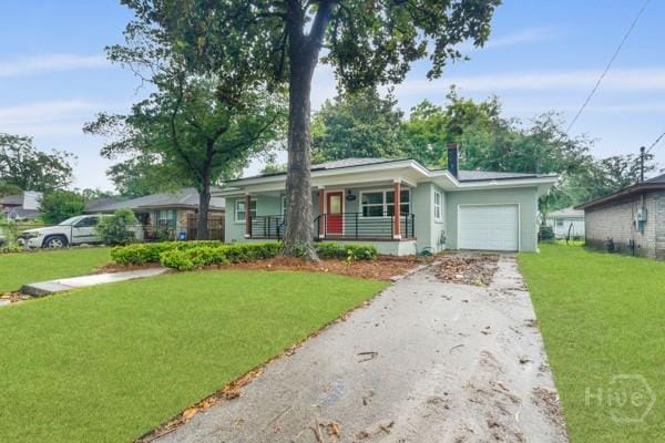 1817 Lloyd St, Savannah, GA 31405 - ranch-style home featuring a garage, asphalt driveway, a porch, and a front yard