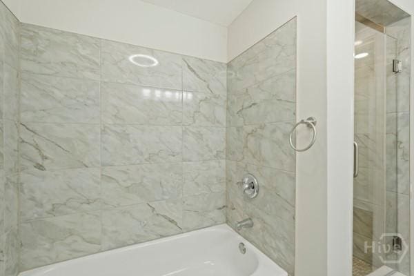 1817 Lloyd St, Savannah, GA 31405 - bathroom featuring combined bath / shower with glass door