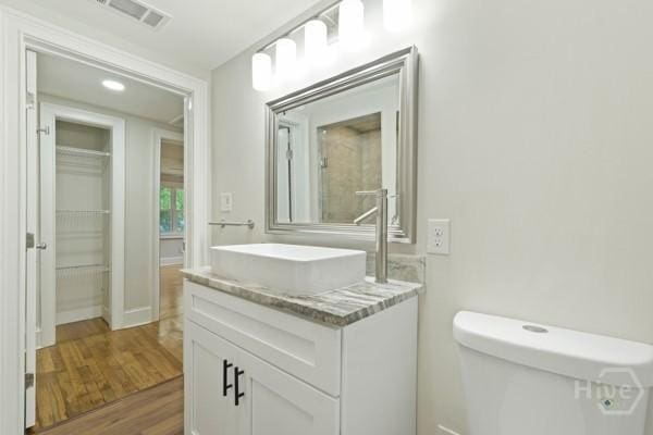 1817 Lloyd St, Savannah, GA 31405 - bathroom featuring vanity and wood finished floors