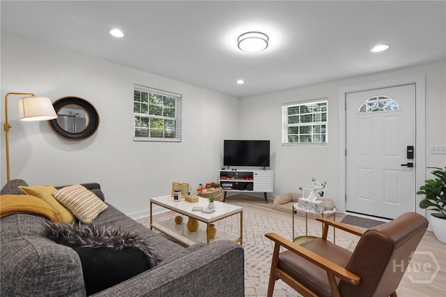1220 E 69th St, Savannah, GA 31404 - living area with plenty of natural light, recessed lighting, and light wood finished floors