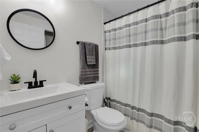 1220 E 69th St, Savannah, GA 31404 - bathroom featuring vanity, toilet, and a shower with curtain