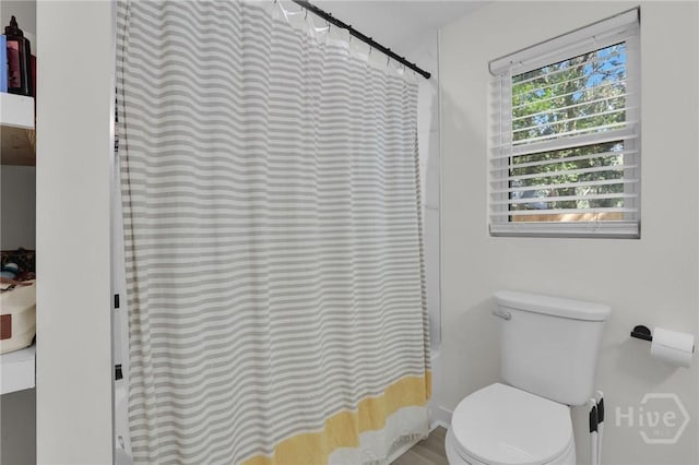1220 E 69th St, Savannah, GA 31404 - full bath featuring toilet and curtained shower