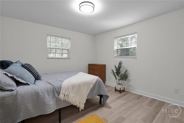 1220 E 69th St, Savannah, GA 31404 - bedroom featuring light wood finished floors and baseboards