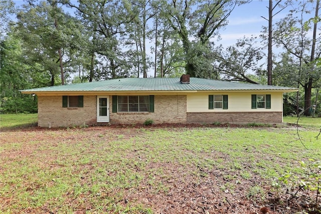 2317 Ga Highway 24, Statesboro, GA 30461 - single story home featuring brick siding, a front lawn, and metal roof