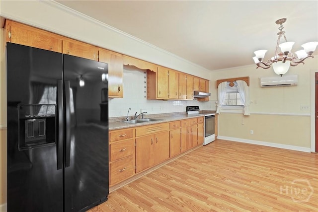 2317 Ga Highway 24, Statesboro, GA 30461 - kitchen with black fridge, white range with electric stovetop, a sink, a wall mounted air conditioner, and a chandelier