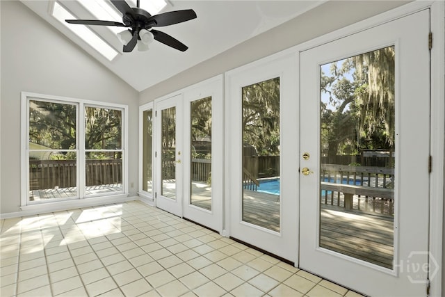 550 Strathy Hall Dr, Richmond Hill, GA 31324 - unfurnished sunroom featuring french doors, vaulted ceiling, tile patterned floors, and a skylight