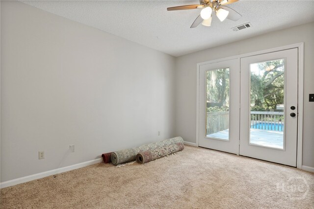 550 Strathy Hall Dr, Richmond Hill, GA 31324 - carpeted empty room featuring a ceiling fan and a textured ceiling