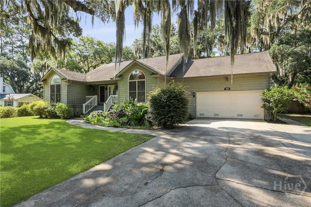 550 Strathy Hall Dr, Richmond Hill, GA 31324 - ranch-style house featuring driveway, a front yard, and a garage