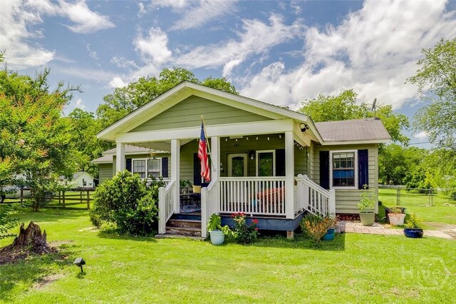 149 Spruce St, Richmond Hill, GA 31324 - view of front of property with a porch