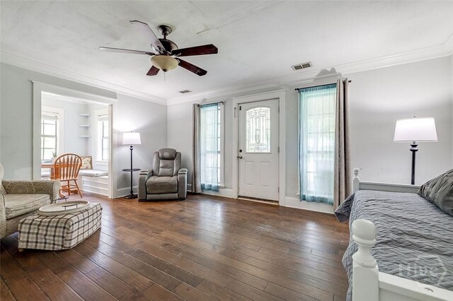149 Spruce St, Richmond Hill, GA 31324 - foyer entrance with crown molding, ceiling fan, and hardwood / wood-style floors