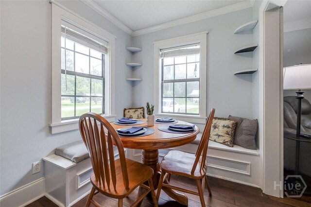 149 Spruce St, Richmond Hill, GA 31324 - dining space with ornamental molding and dark wood finished floors
