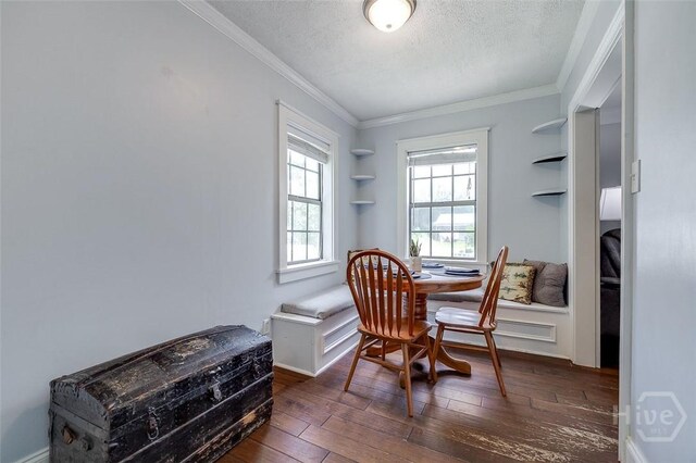 149 Spruce St, Richmond Hill, GA 31324 - dining room with a textured ceiling, dark wood-style flooring, crown molding, and baseboards