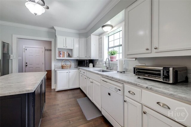 149 Spruce St, Richmond Hill, GA 31324 - kitchen with white dishwasher, a sink, open shelves, crown molding, and white cabinetry