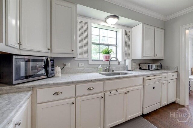 149 Spruce St, Richmond Hill, GA 31324 - kitchen with stainless steel microwave, a sink, dishwasher, dark wood finished floors, and white cabinets