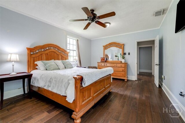 149 Spruce St, Richmond Hill, GA 31324 - bedroom with crown molding, dark wood-style floors, baseboards, and a ceiling fan