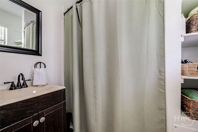 149 Spruce St, Richmond Hill, GA 31324 - bathroom featuring vanity and shower / bath combo