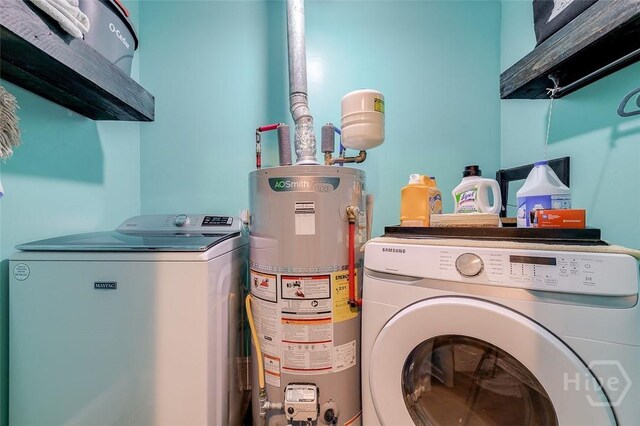 149 Spruce St, Richmond Hill, GA 31324 - washroom with washer / dryer and gas water heater