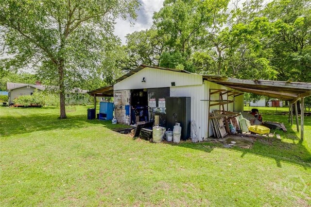 149 Spruce St, Richmond Hill, GA 31324 - view of pole building featuring a lawn