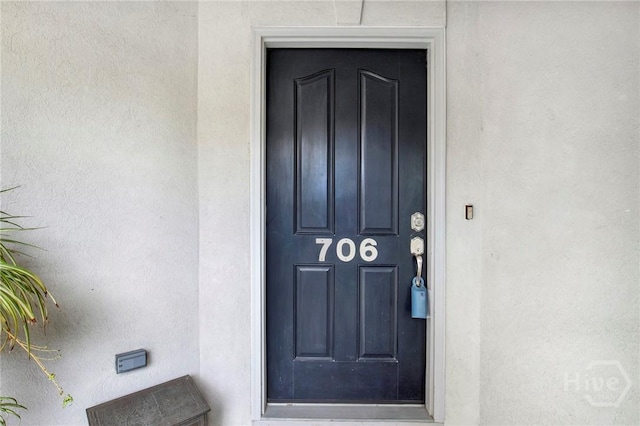 411 Southbridge Blvd Unit 706, Savannah, GA 31405 - doorway to property with stucco siding
