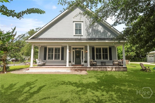 49 Tidewater Rd, Savannah, GA 31406 - back of property with a porch, a lawn, and roof with shingles