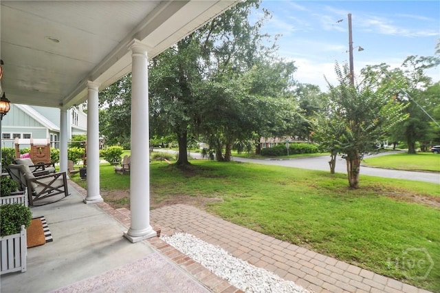 49 Tidewater Rd, Savannah, GA 31406 - porch with a yard