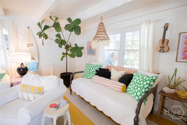 1017 Lovell Ave, Tybee Island, GA 31328 - living room featuring beamed ceiling