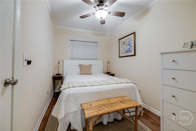 1217 Bay St Unit 105A, Tybee Island, GA 31328 - bedroom featuring wood finished floors, ornamental molding, and a ceiling fan