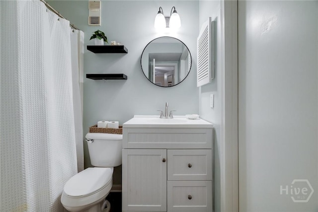 1217 Bay St Unit 105A, Tybee Island, GA 31328 - bathroom with vanity and a shower with shower curtain