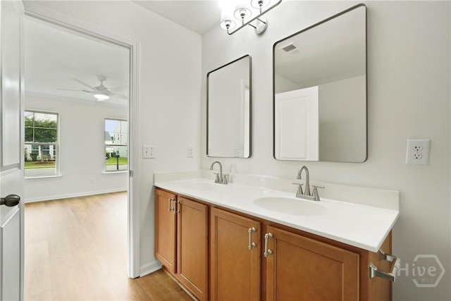 3 Chandler Bluff Dr, Savannah, GA 31407 - bathroom featuring wood finished floors, double vanity, and ceiling fan