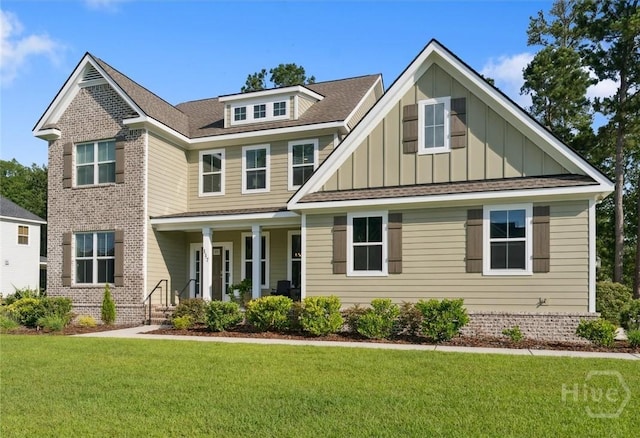 117 Oakcrest Dr W, Savannah, GA 31405 - craftsman inspired home with board and batten siding, covered porch, a front yard, and a shingled roof