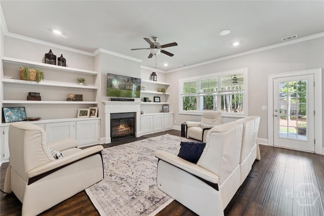 117 Oakcrest Dr W, Savannah, GA 31405 - living area with ornamental molding, a ceiling fan, dark wood-type flooring, recessed lighting, and a fireplace with flush hearth