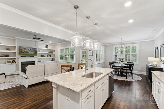 117 Oakcrest Dr W, Savannah, GA 31405 - kitchen featuring dishwasher, dark wood-type flooring, healthy amount of natural light, decorative light fixtures, and crown molding