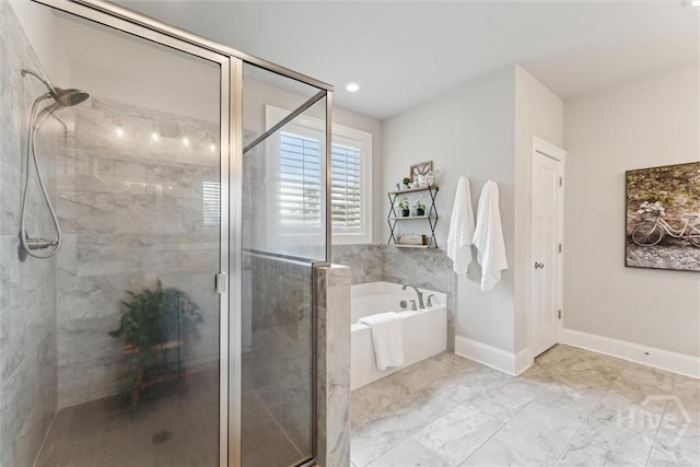 117 Oakcrest Dr W, Savannah, GA 31405 - bathroom with a bath, a shower stall, and marble look tile flooring