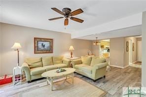1000 New Sea Island Rd Unit 15, Saint Simons Island, GA 31522 - living area featuring a ceiling fan and wood finished floors