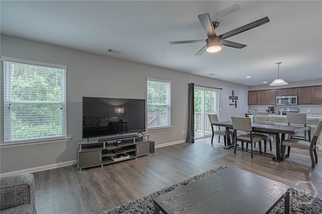 452 Keller Rd, Rincon, GA 31326 - living area with ceiling fan and wood finished floors