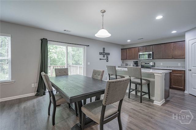 452 Keller Rd, Rincon, GA 31326 - dining room with healthy amount of natural light, recessed lighting, and wood finished floors