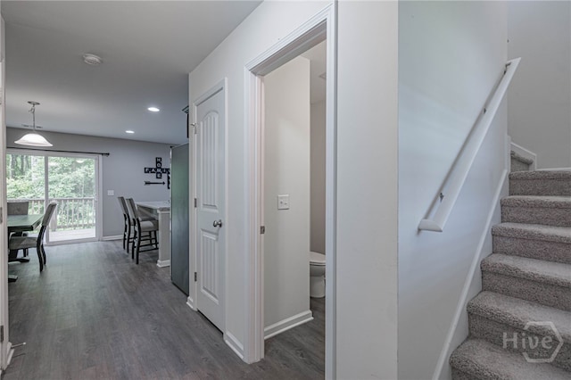 452 Keller Rd, Rincon, GA 31326 - corridor with dark wood finished floors, stairs, and recessed lighting