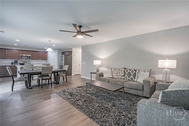452 Keller Rd, Rincon, GA 31326 - living room featuring light wood finished floors, a ceiling fan, and recessed lighting