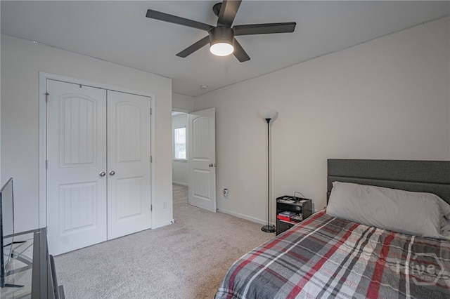452 Keller Rd, Rincon, GA 31326 - bedroom with carpet flooring, a closet, and a ceiling fan