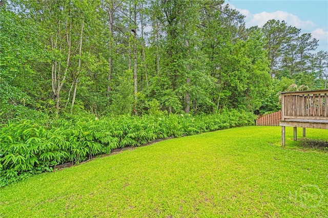 452 Keller Rd, Rincon, GA 31326 - view of grassy yard with a deck