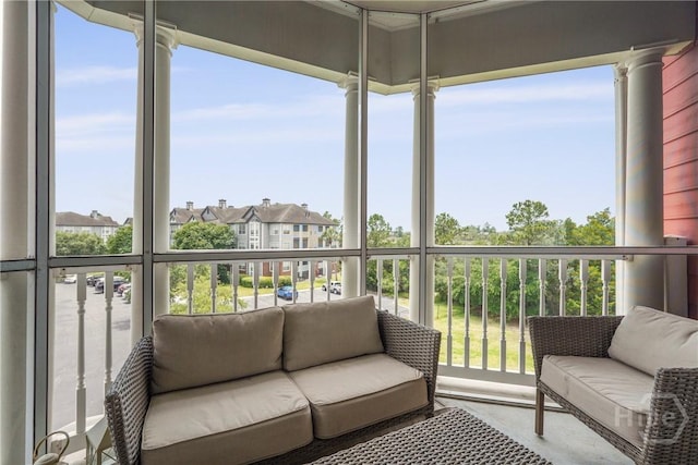 2034 Whitemarsh Way, Savannah, GA 31410 - sunroom featuring healthy amount of natural light and a residential view