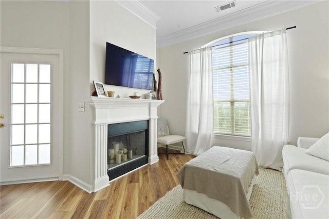 2034 Whitemarsh Way, Savannah, GA 31410 - bedroom with ornamental molding, wood finished floors, and a fireplace