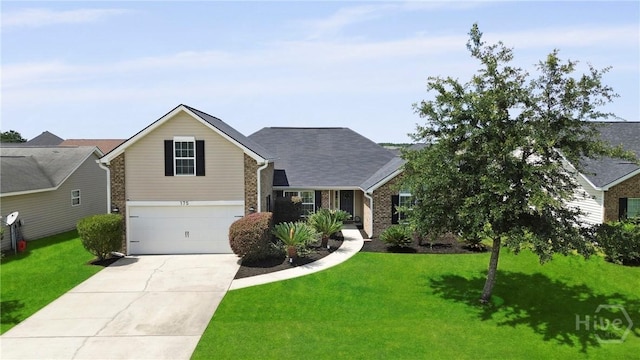 175 Willow Point Cir, Savannah, GA 31407 - view of front of home with driveway, a front lawn, and a garage