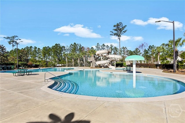 175 Willow Point Cir, Savannah, GA 31407 - community pool with a water slide and a patio area